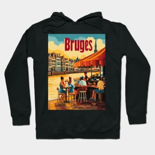 Visitors savor delicious food while seated at a charming riverside cafe in Bruges. The picturesque architecture and serene water create a Hoodie